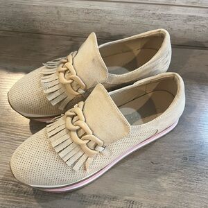 Coconuts brand platform sneakers.
